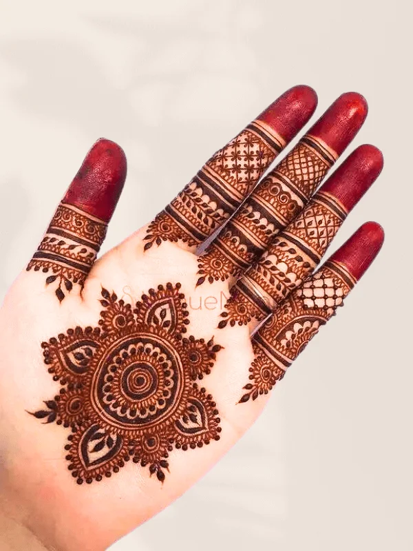 Front hand adorned with mehndi A tale of beauty and simplicity