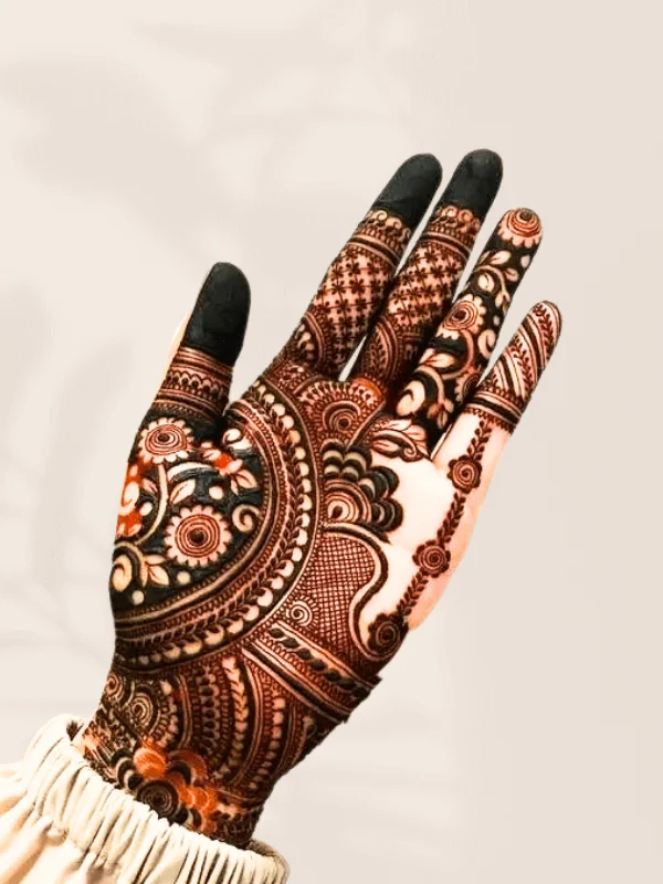 Redefining elegance with a simple mehndi design on the front hand