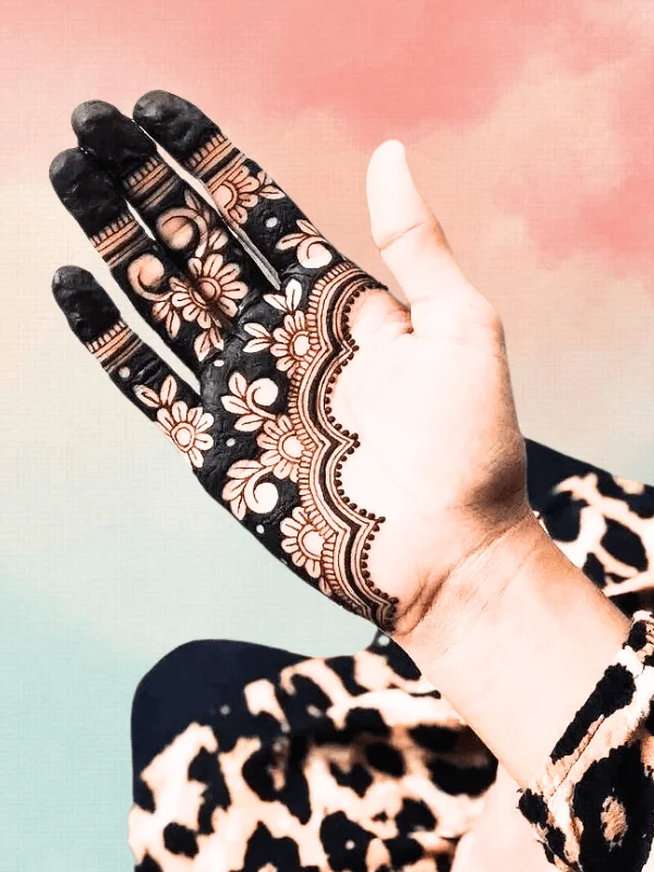 Simple mehndi designs for the front hand Less is more